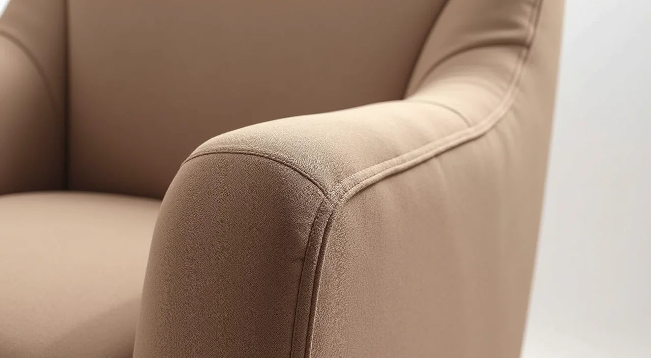 Close-up examination of upholstery stitching and frame construction details