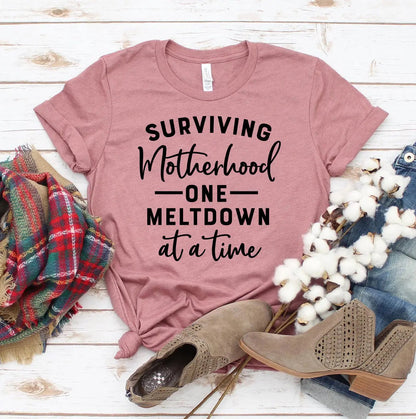 Surviving Motherhood One Meltdown at a Time T-Shirt - Women’s Fashion - Women’s Clothing - Tops & Tees - T-Shirts